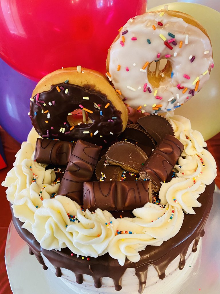 Donuts taste best when they’re on top of a cake!